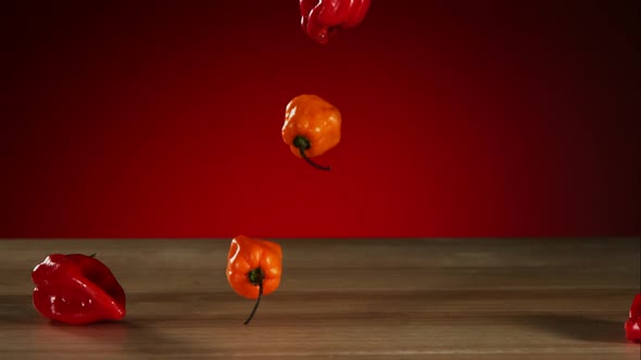 Peppers falling bouncing in ultra slow mo 