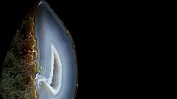 Raw Agate Mineral on a Black Background