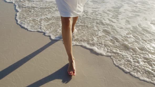 Young woman by the sea