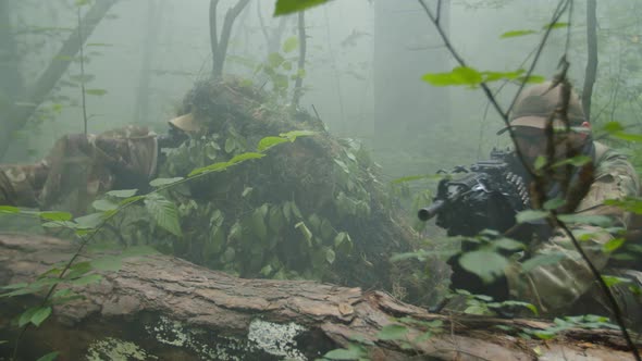 Sniper and Gunner Observing Enemy Territory Covered By Smoke Cloud