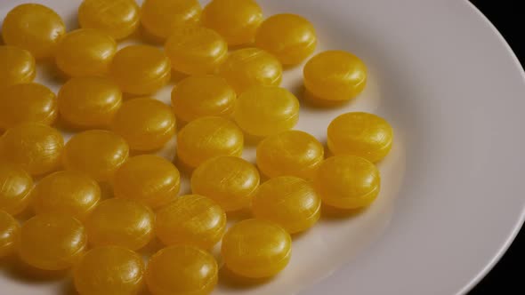 Rotating shot of butterscotch candies 