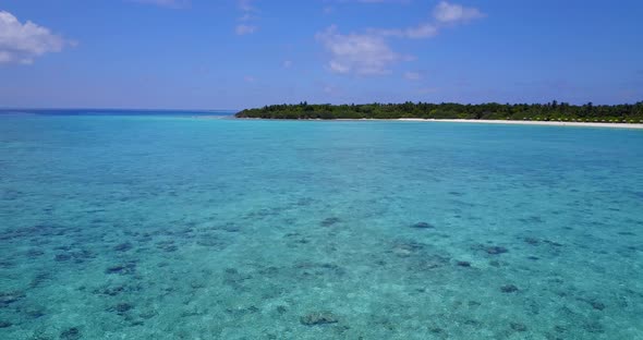 Luxury above copy space shot of a white sandy paradise beach and blue ocean background in high resol