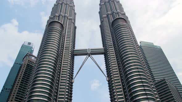 Petronas Twin Towers with Fast Flying Clouds Time-lapse Kuala Lumpur Malaysia alt