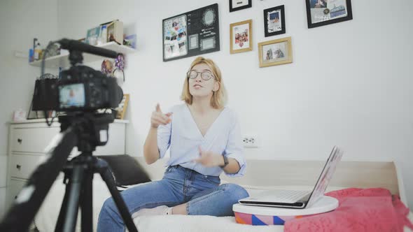 Young Blogger Making Her Video for Blog. The Girl Finish Her Recording and Turns Off the Camera