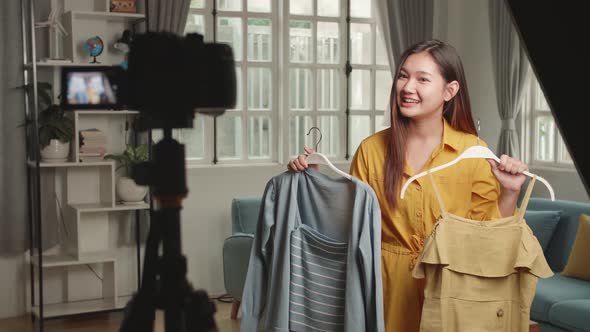 Fashion Blogger Woman Showing Casual Colourful Shirts On Camera