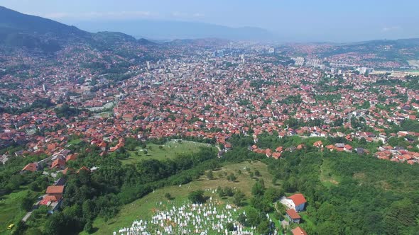 Flying over Bosnian town with Muslim graveyards