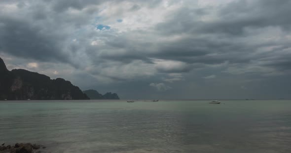 Time Lapse of Rain Clouds Over Beach and Sea Landscape with Boats