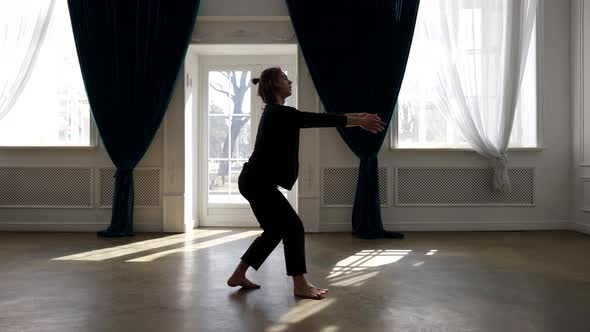 Artistic Male Dancer is Dancing Alone in Rehearsal Room Contemporary Choreography