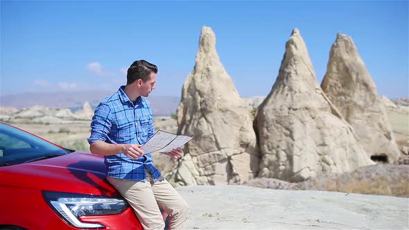 Happy Man on Summer Vacation in Famous Place