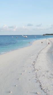 Vertical Video Boats in the Ocean Near the Coast of Zanzibar Tanzania