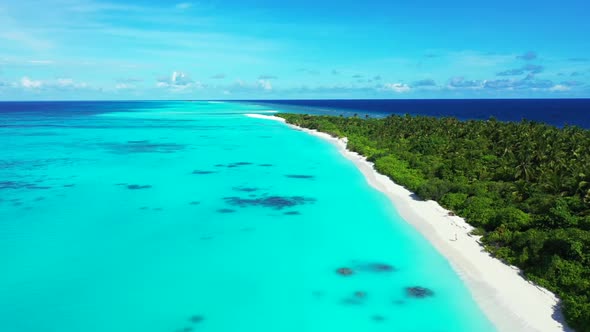 Aerial above sky of luxury coastline beach vacation by turquoise water and clean sandy background of