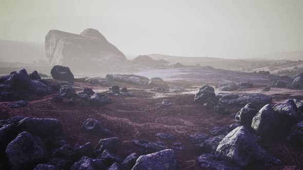 Stones in Snow on Moutain in Summer