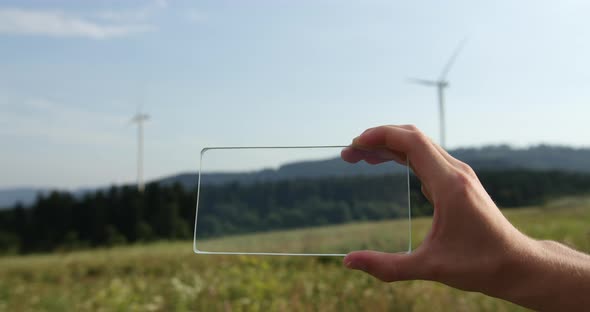 Hand Architect or Engineer Using Smartphone Transparent Hologram Digital Display on the Background