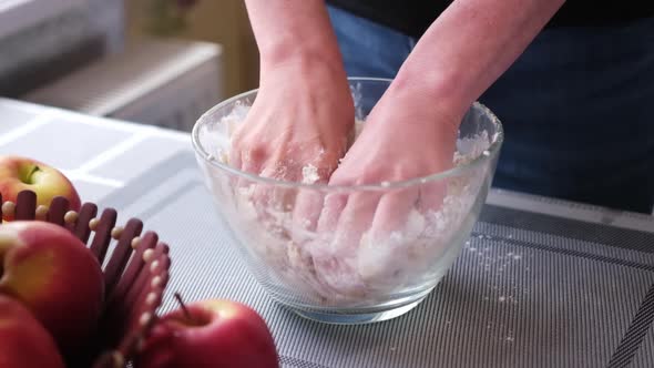 Apple Pie Preparation Series  Kneading and Mixing Flour in a Glass Bowl in Slow Motion
