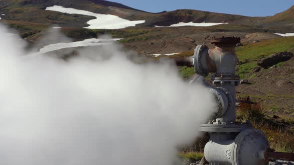 Emission of Thermal Steam-Water Mixture from Well in Geothermal Deposit Area