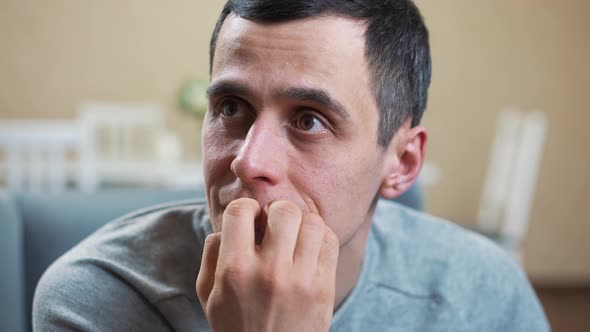 Man Nervous and Bites His Nails