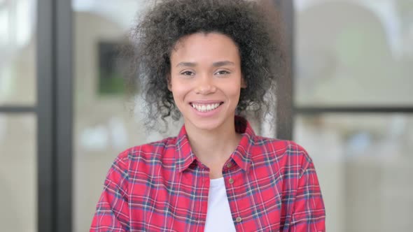 Portrait of Attractive African Woman Smiling at Camera