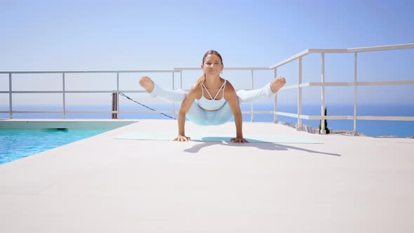 Beautiful young woman doing yoga