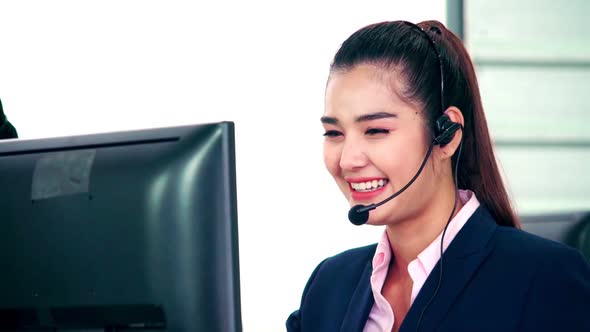 Business People Wearing Headset Working in Office