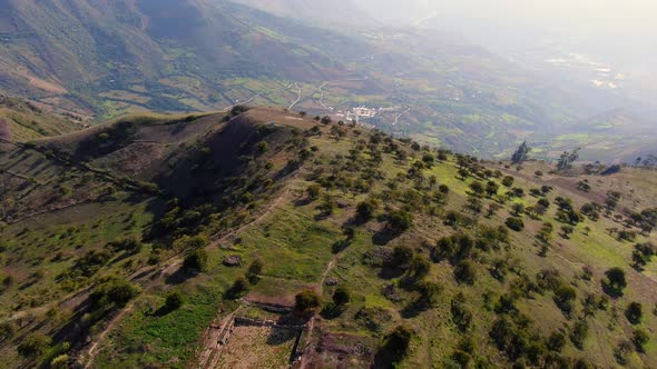 Aerial Revealing Kuntur Wasi Archaeological Site On Andes Mountain Top