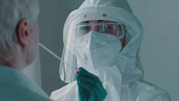 Portrait of Blueeyed Woman Doctor Scientist Medical Nurse Holding Cotton Swab in Hand Takes Sample