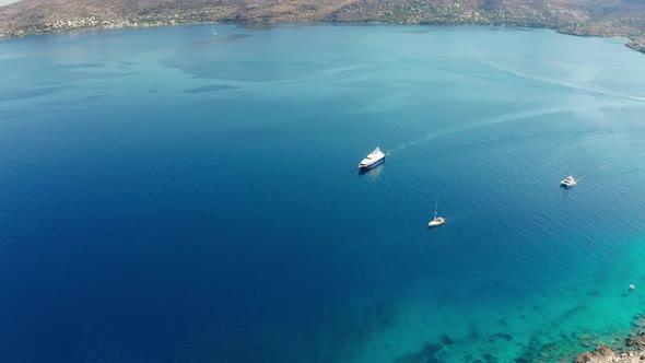 Yacht Near the Green Island in Greece