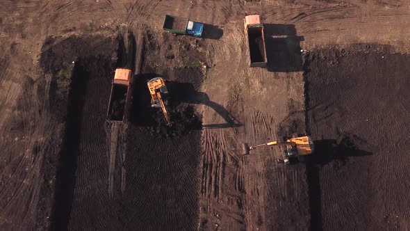 Aerial Construction Site with Machinery, Truck, Excavator