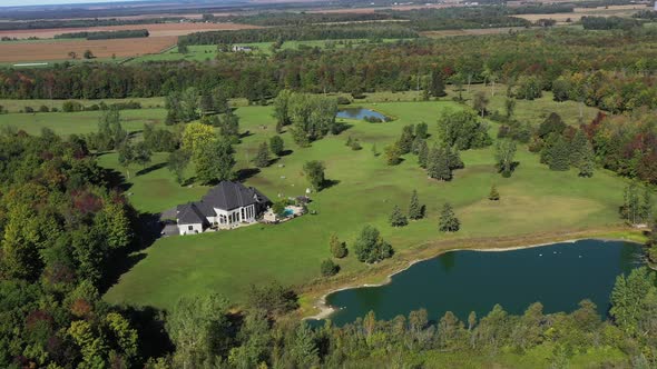 wealthy oasis home surrounded by forest has unreal property.