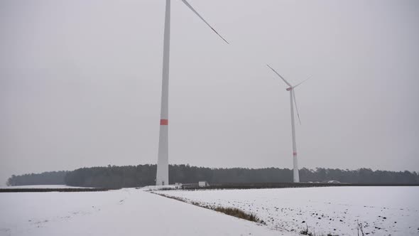 Wind turbines in winter with snow