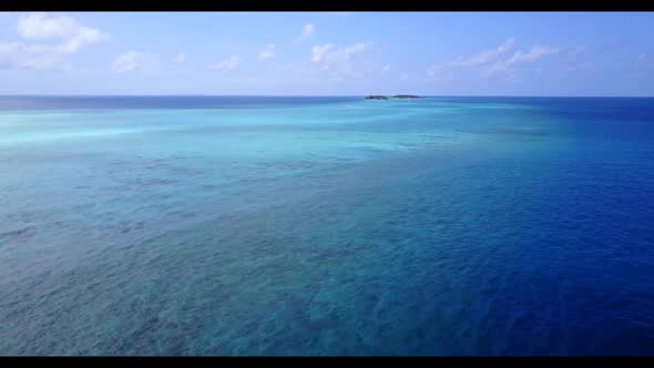 Aerial flying over tourism of marine bay beach holiday by clear sea with bright sandy background of 