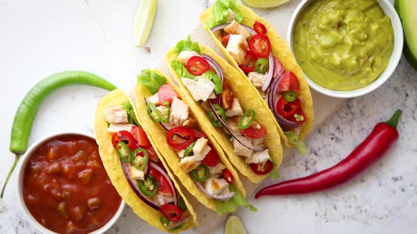 Tasty Mexican Meat Tacos Served with Various Vegetables and Salsa