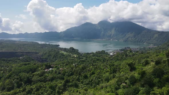 Timelapse of Aerial view Batur lake Kintamani Bali with cloud in the background