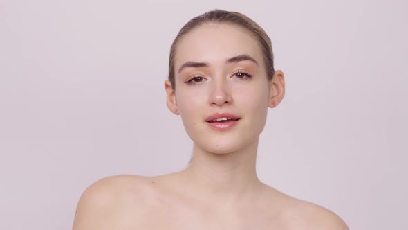 Young Woman with Clean Skin Smiling