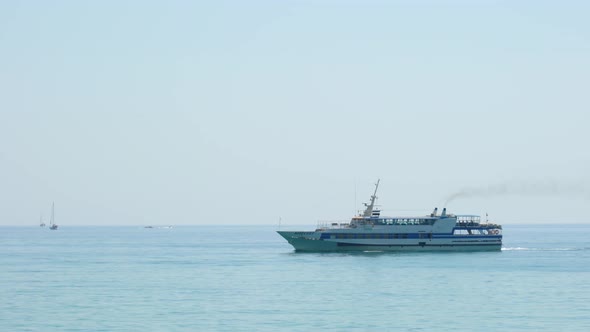 the Ship is Moving Along the Horizon of the Sea