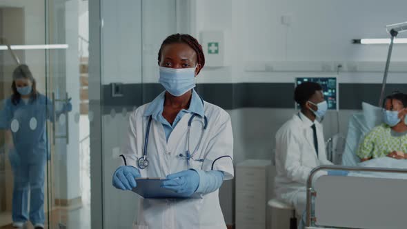 Portrait of Woman Working As Doctor with White Coat