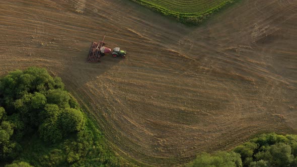 Aerial Footage of Tractor Sowing Rapeseed