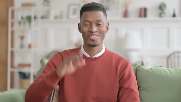 Portrait of African Man Talking on Online Video Call