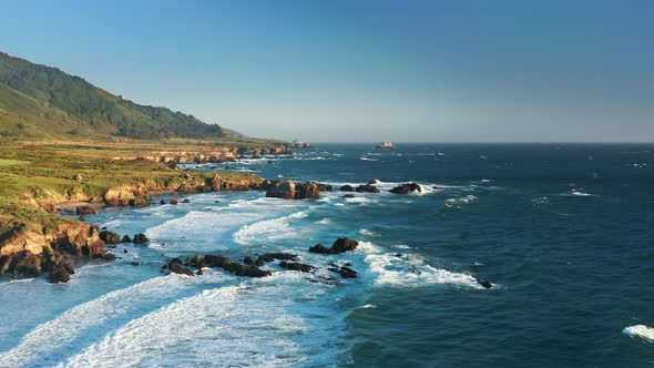 Sea Waves Crashing on the Picturesque Sea Rocks, Famous West Coast USA, Sunset