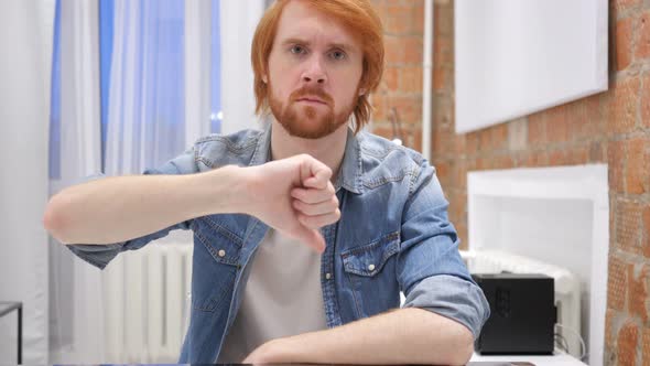 Beard Man Gesturing Thumbs Down