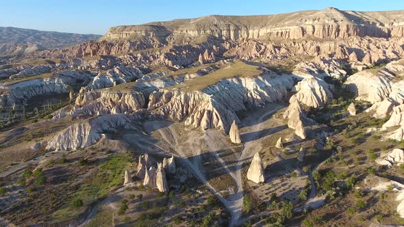 Hoodoos, Fairy Chimneys and Sedimentary Volcanic Rock Formations in Eroded Cappadocia Valley, Turkey