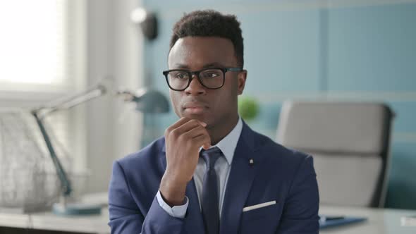 Portrait of Pensive African Businessman Thinking