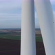 Rotating Wind Turbine Blades in Close Up Ascending Aerial Drone View - VideoHive Item for Sale