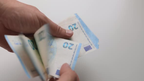 Closeup Hands Counting 20 Euros Banknotes