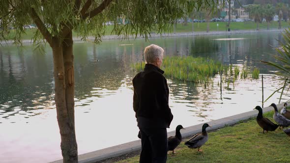 Senior Woman Working Out In The Park