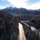 Aerial view of mountain twisted road in the winter. Epic, snowy white winter in the mountains. - VideoHive Item for Sale