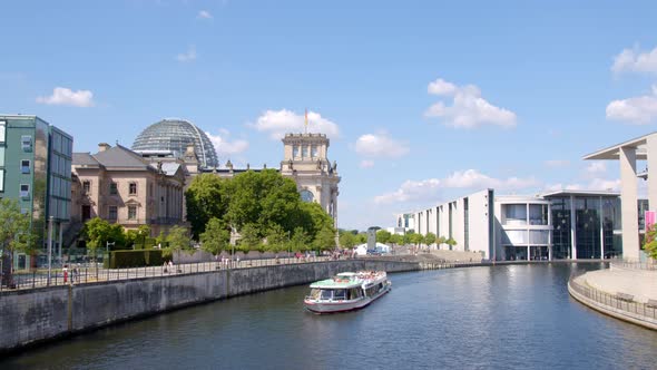 Touristic Boat Cruise on Spree in Berlin Government District in Summer