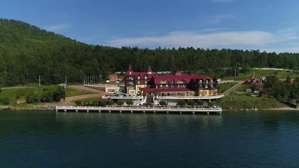 Beautiful Aerial View of Country Hotel on Sea Coast on Summer Day