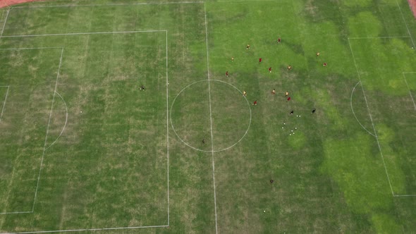 Aerial view of people playing "tiki-taka tactics" in football