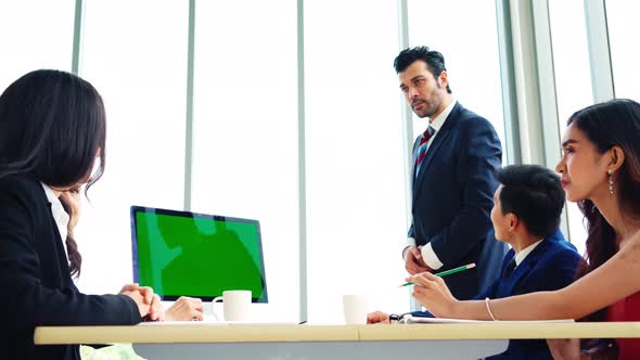 Business People in the Conference Room with Green Screen