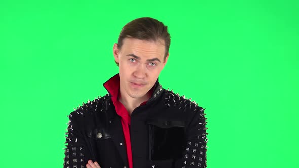 Guy Is Offended and Looks Away. Green Screen